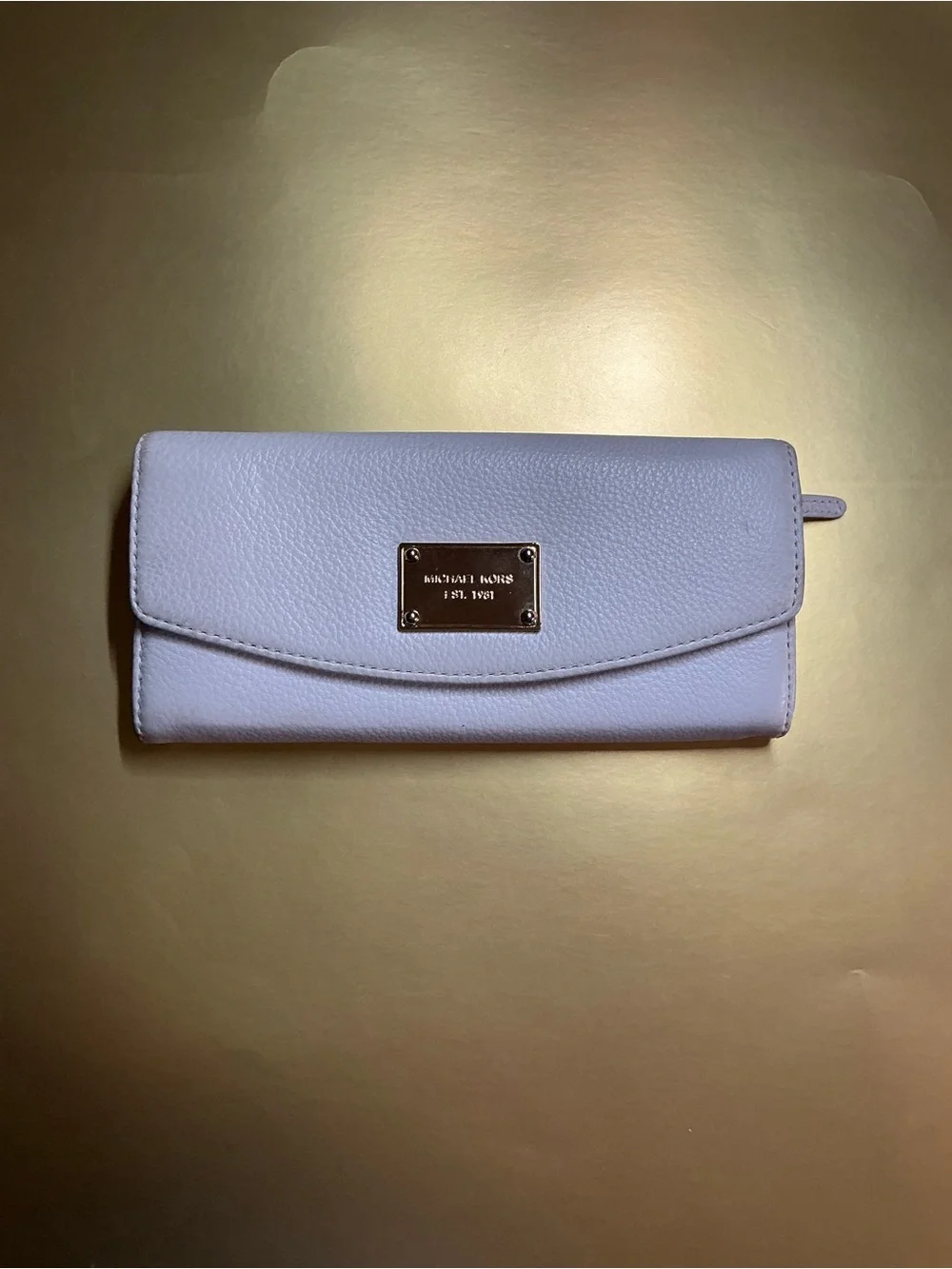 Michael Kors previously owned